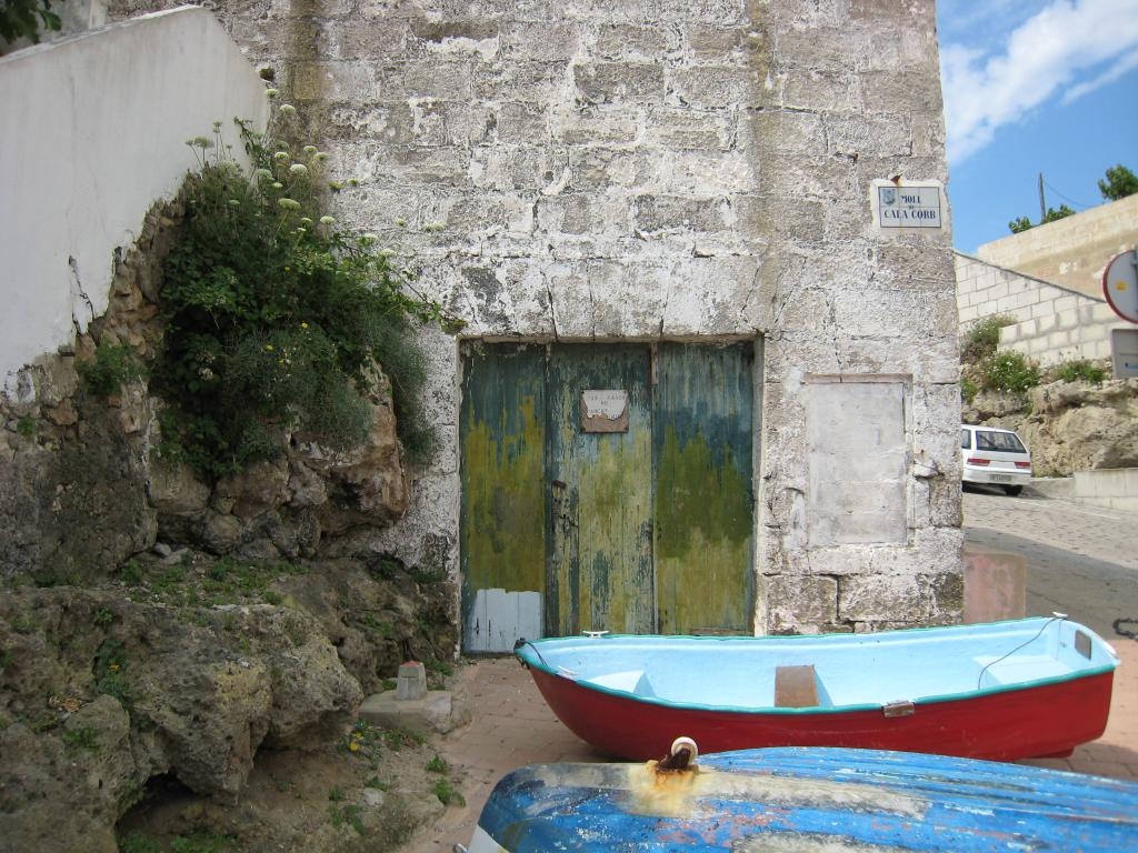 Old boat, newer boat, very old door