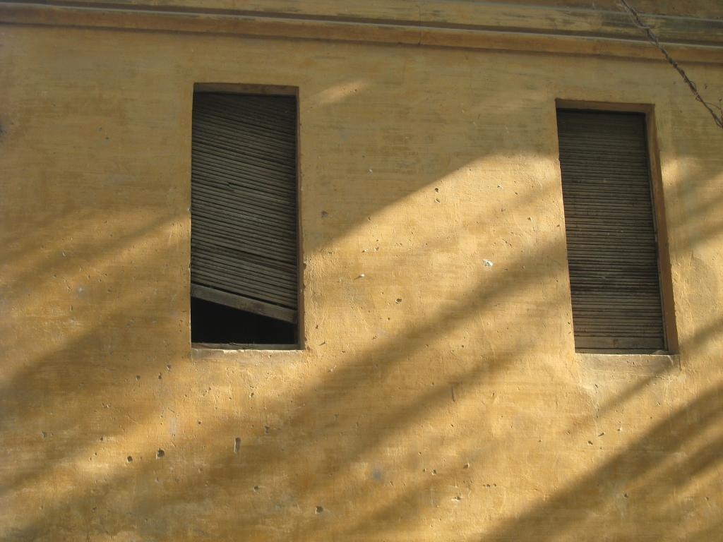 Morning sun over a disastrous house